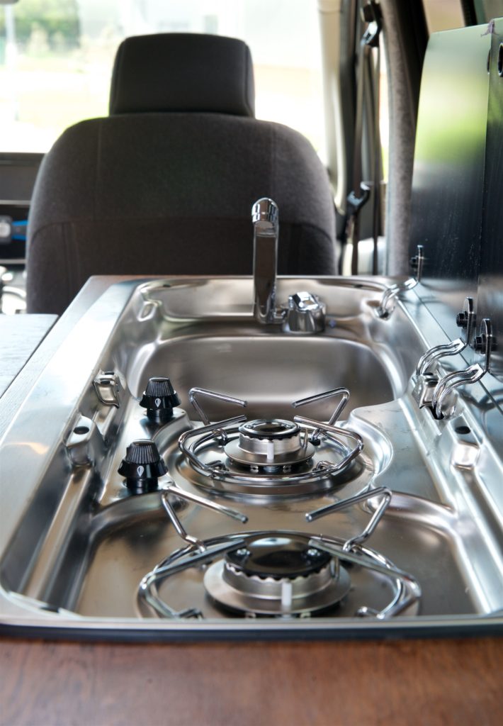Spike Kane surfing|van community|||Accessible campervan|The Wave Bristol|Dog in campervan|